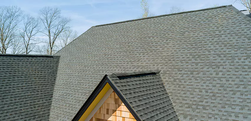 Replacing Vinyl Siding With Cedar Shingles in Tuttle