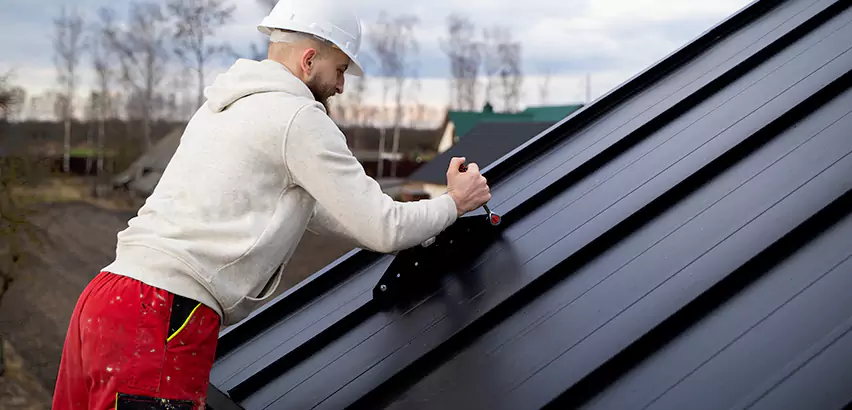 Tin Roof Ridge Cap Installation in Tuttle
